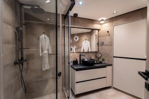 Shower, hair dryer, towels, soap