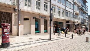 A street view with a building labeled 'Normal' and a red mailbox.