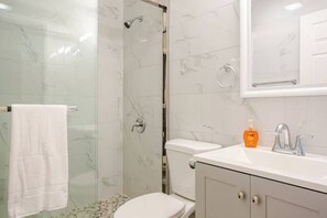 Shower, hair dryer, towels