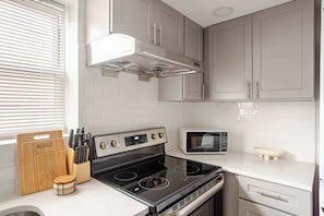 Fridge, microwave, dishwasher, coffee/tea maker