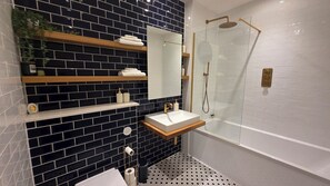 Hair dryer, towels, soap, shampoo