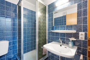 Ducha y secador de pelo