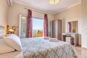 3 habitaciones, tabla de planchar con plancha y ropa de cama 