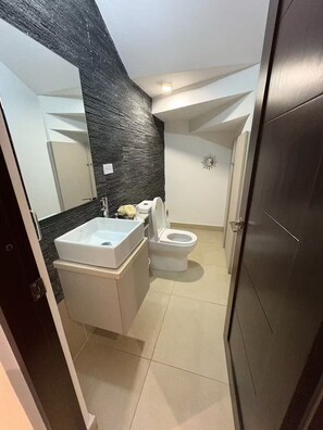 Shower, towels, soap, toilet paper
