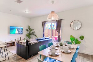 Basic Townhome, 3 Bedrooms, Patio | Living area | 60-inch flat-screen TV with cable channels - Prime Townhouses Near Design District (North Miami Beach)