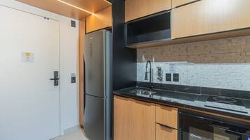 Fridge, microwave, stovetop, coffee/tea maker