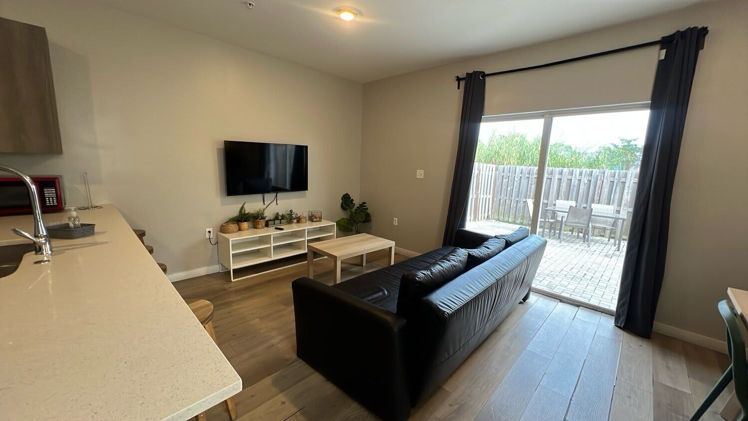 Family Townhome, 3 Bedrooms, Patio | Living area | 60-inch flat-screen TV with cable channels