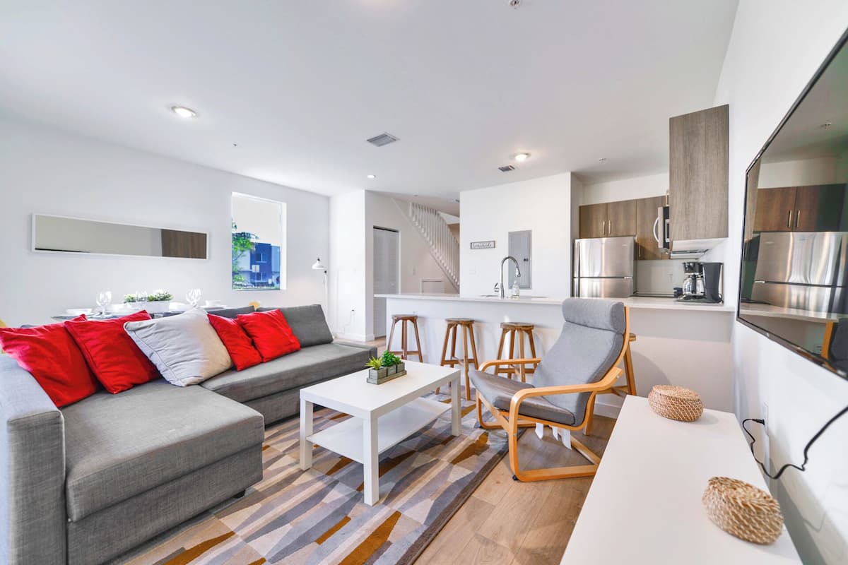 Family Townhome, 3 Bedrooms, Patio | Living area | 60-inch flat-screen TV with cable channels
