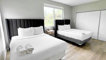 Family Townhome, 3 Bedrooms, Patio | Premium bedding, blackout drapes, iron/ironing board, free WiFi