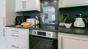 Fridge, microwave, oven, high chair