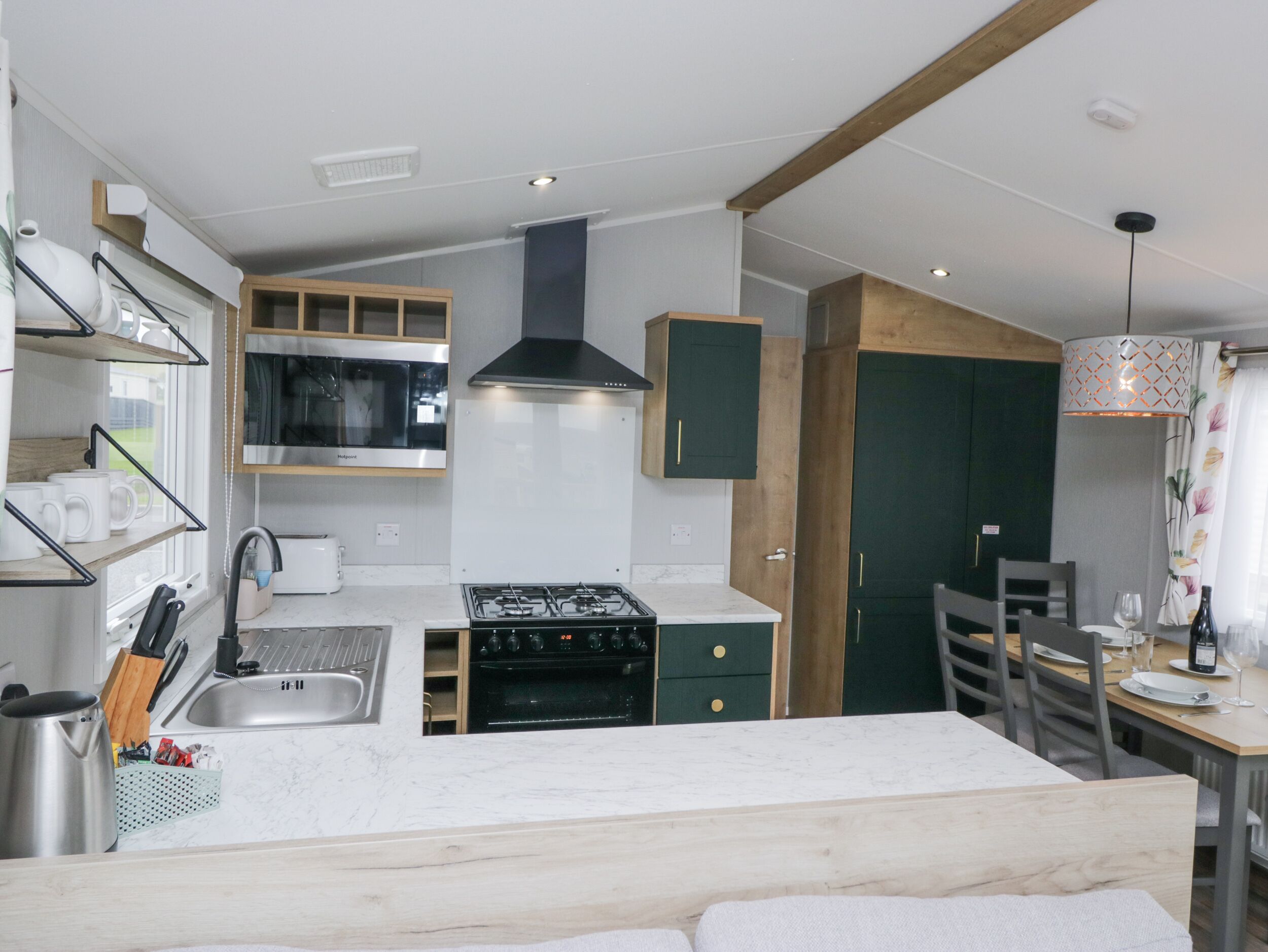 Fridge, microwave, toaster, cookware/dishes/utensils