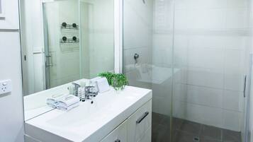 Hair dryer, towels, soap, shampoo