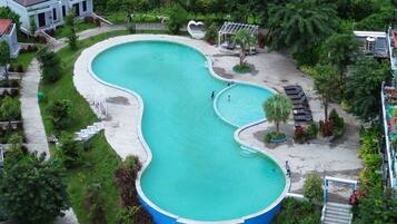 2 outdoor pools, pool umbrellas, pool loungers
