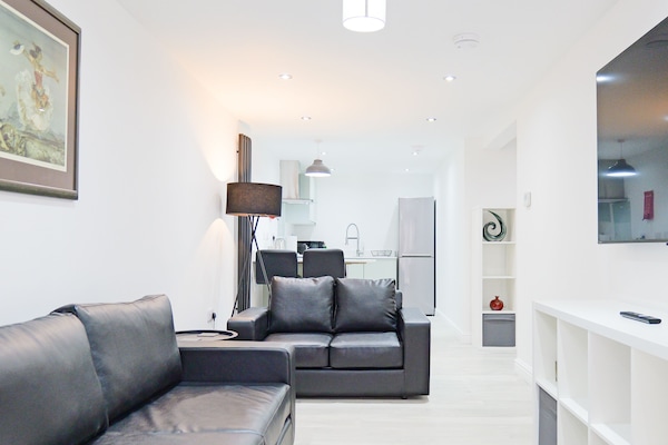 Apartment, 1 Bedroom | Living area | Flat-screen TV