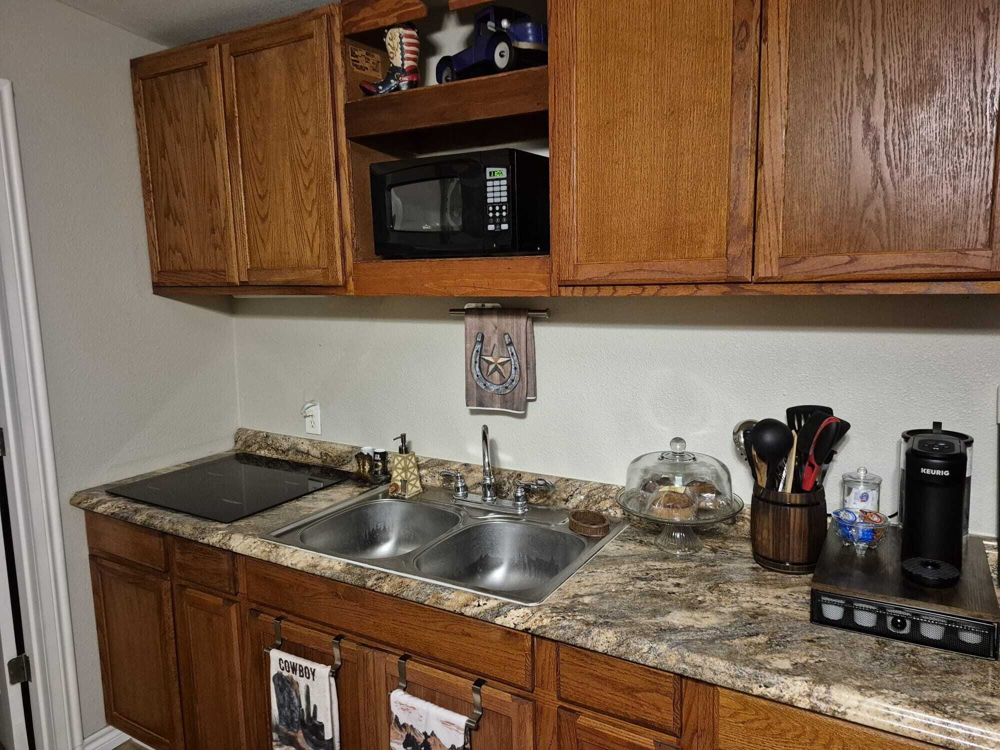 Fridge, microwave, stovetop, coffee/tea maker