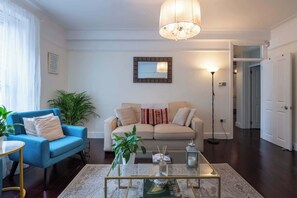 TV, fireplace, books