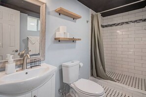Hair dryer, towels, soap, shampoo
