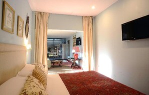 Deluxe Suite, 1 King Bed, Jetted Tub, Garden View | Premium bedding, down comforters, memory foam beds