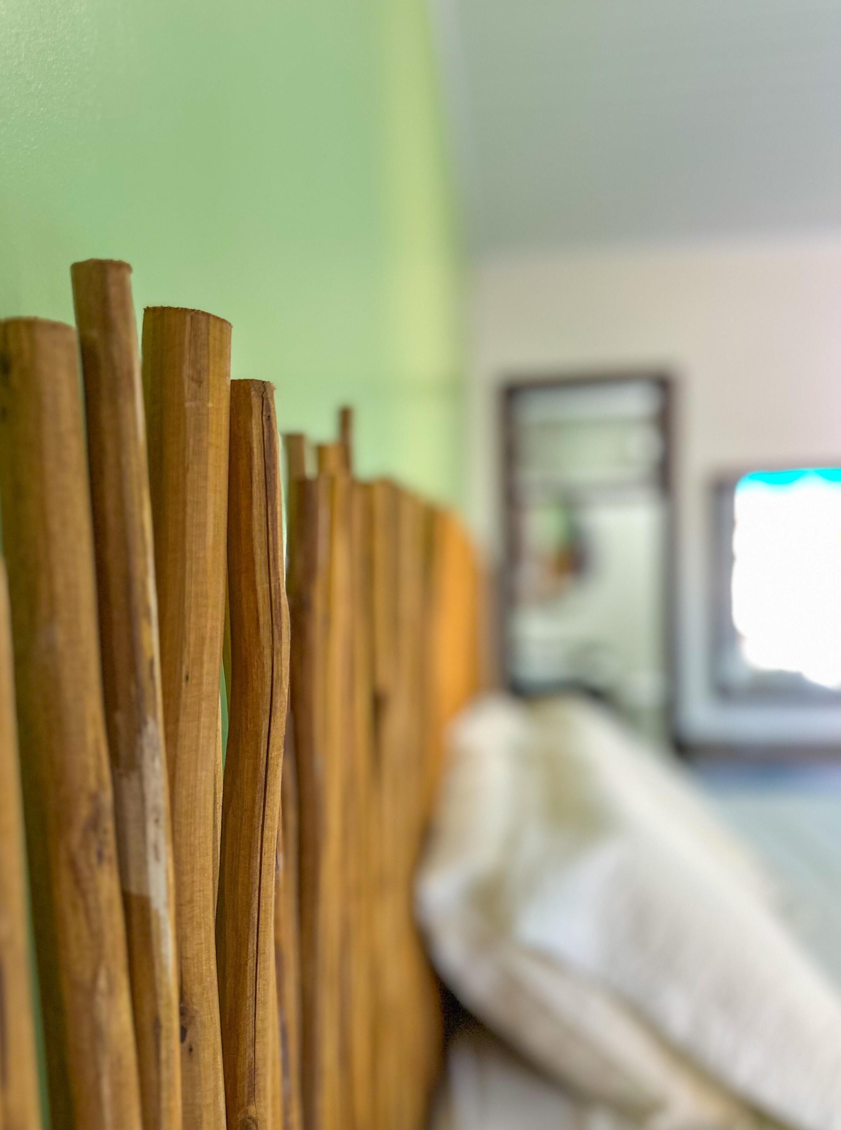 A close-up of wooden slats, likely part of a room's decor or furniture.