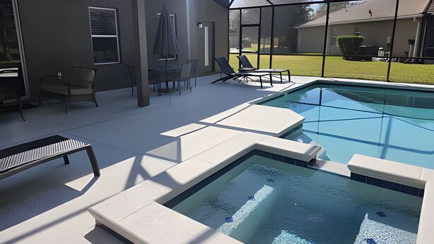 A modern outdoor pool area with a glass-enclosed patio, lounge chairs, and a dining table. - New to Market Spacious Private Pool Retreat (Kissimmee)