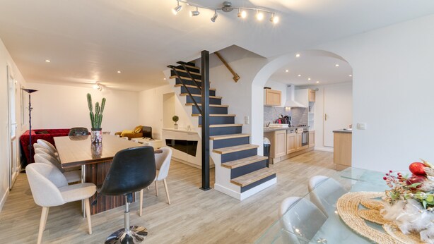 A modern interior with a staircase, dining area, and kitchen. - Dream Holiday Apartment - Casserousse - 18 Guests at the Foot of the Slopes (chamrousse)