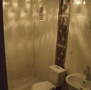 Single Room, Balcony, Garden View | Bathroom | Shower, slippers, soap