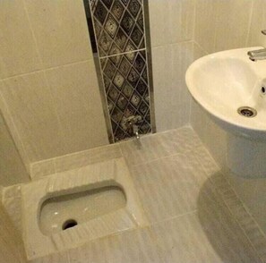Single Room, Balcony, Garden View | Bathroom | Shower, slippers, soap
