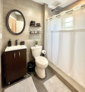 Hair dryer, towels, soap, toilet paper