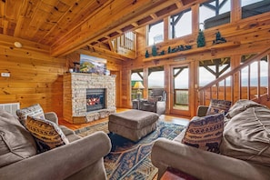 Maison, plusieurs lits, bain à remous, vue montagne (Lookout Lodge) | Coin séjour