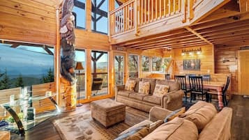 Rom, flere senger, adgang til basseng, fjellutsikt (Eagles View Lodge) | Oppholdsområde | Peis