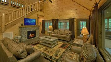 House, Multiple Beds, Hot Tub, Pool View (Adventure Lodge) | Living area | Fireplace