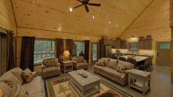 House, Multiple Beds, Hot Tub, Pool View (Adventure Lodge) | Living area | Fireplace