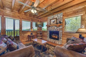 House, Multiple Beds, Hot Tub, Garden View (A Smoky Mountain Hide-A-Way) | Living area | Fireplace - A Smoky Mountain Hide-a-way (Sevierville)