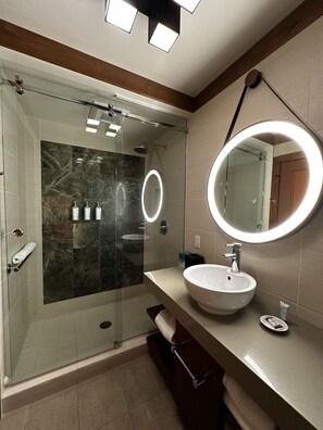 Shower, hair dryer, towels, soap