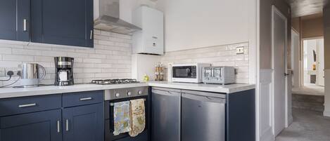 Fridge, microwave, dishwasher, coffee/tea maker