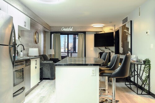 Cozy 2BR Apartment Near Rogers Place | Secure Parking | Walk to Ice District