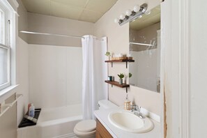 Hair dryer, towels, soap, toilet paper