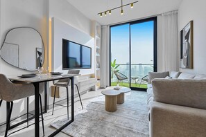 TV, offices - Luxury 1B - CityView Near Parks and Mall JVC (دبي)