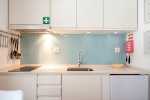 Fridge, microwave, coffee/tea maker, toaster