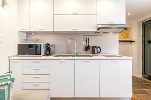 Fridge, microwave, coffee/tea maker, toaster