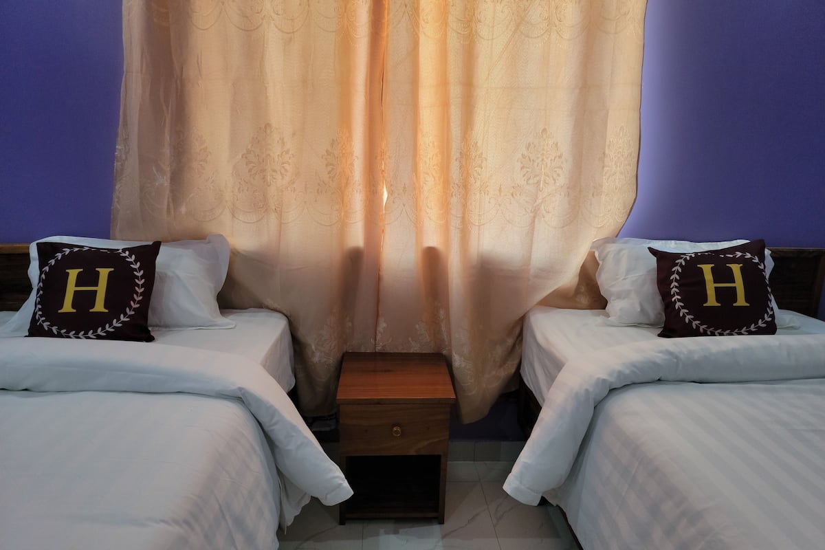 Twin Room, Garden View | Desk, laptop workspace, free WiFi