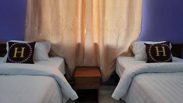 Twin Room, Garden View | Desk, laptop workspace, free WiFi, bed sheets