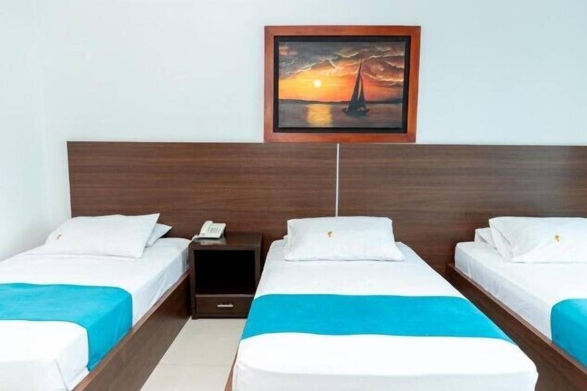 Standard Triple Room | Premium bedding, minibar, free WiFi, bed sheets