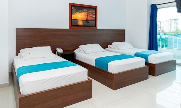 Standard Triple Room | Premium bedding, minibar, free WiFi, bed sheets
