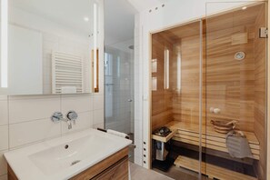 Shower, hair dryer, towels