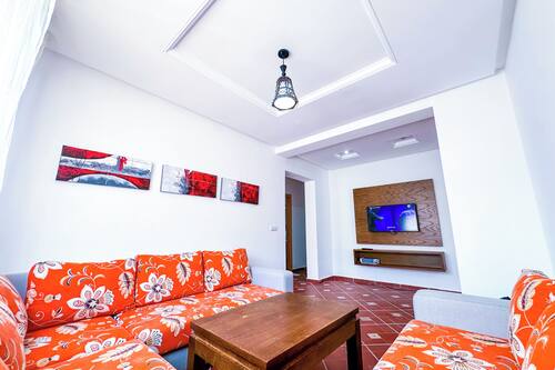 Appartamento familiare, balcone, vista giardino | Area soggiorno