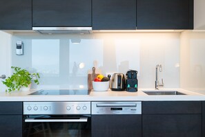 Fridge, oven, dishwasher, coffee/tea maker