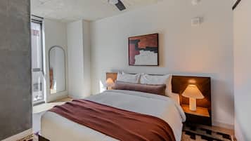 Suite, 1 Bedroom | Desk, laptop workspace, blackout curtains, iron/ironing board