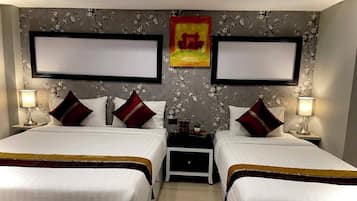 Chambre Triple Deluxe | Coffres-forts dans les chambres, Wi-Fi gratuit