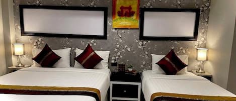 Chambre Triple Deluxe | Coffres-forts dans les chambres, Wi-Fi gratuit